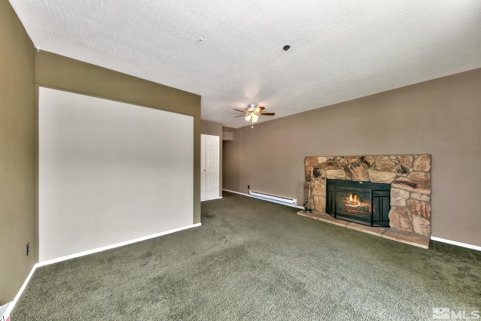 313 Tramway Drive, Unit 9 Stateline, NV 89449 - Photo 10 of 21 a view of empty room with a fireplace