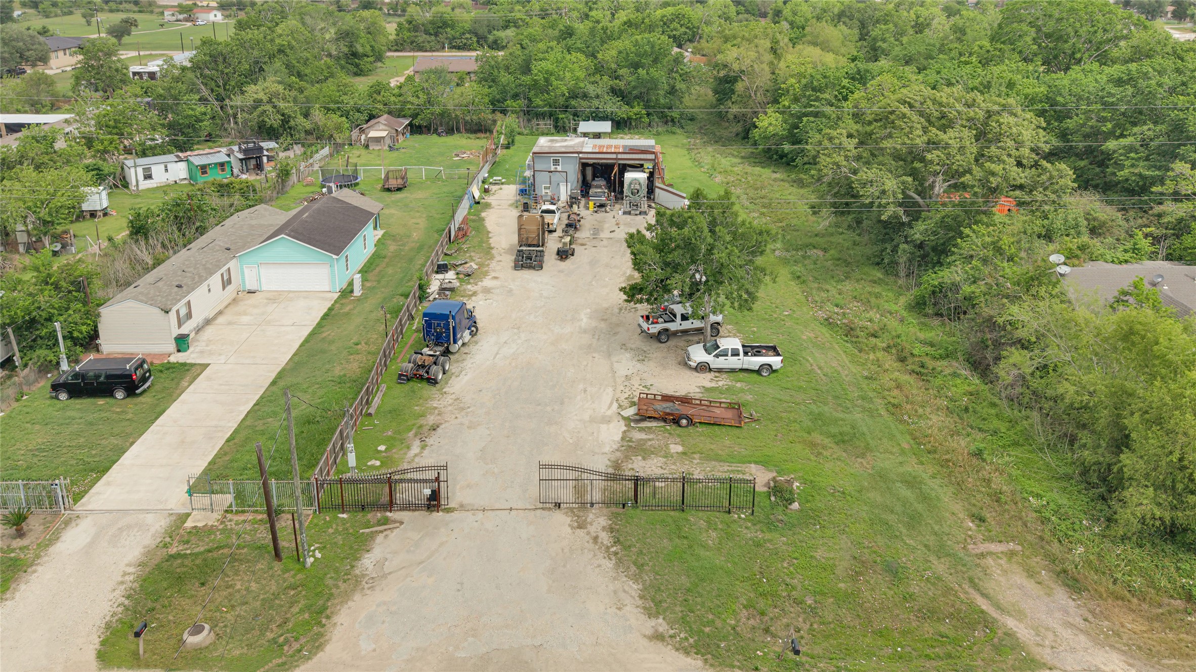 an aerial view of a house with a garden