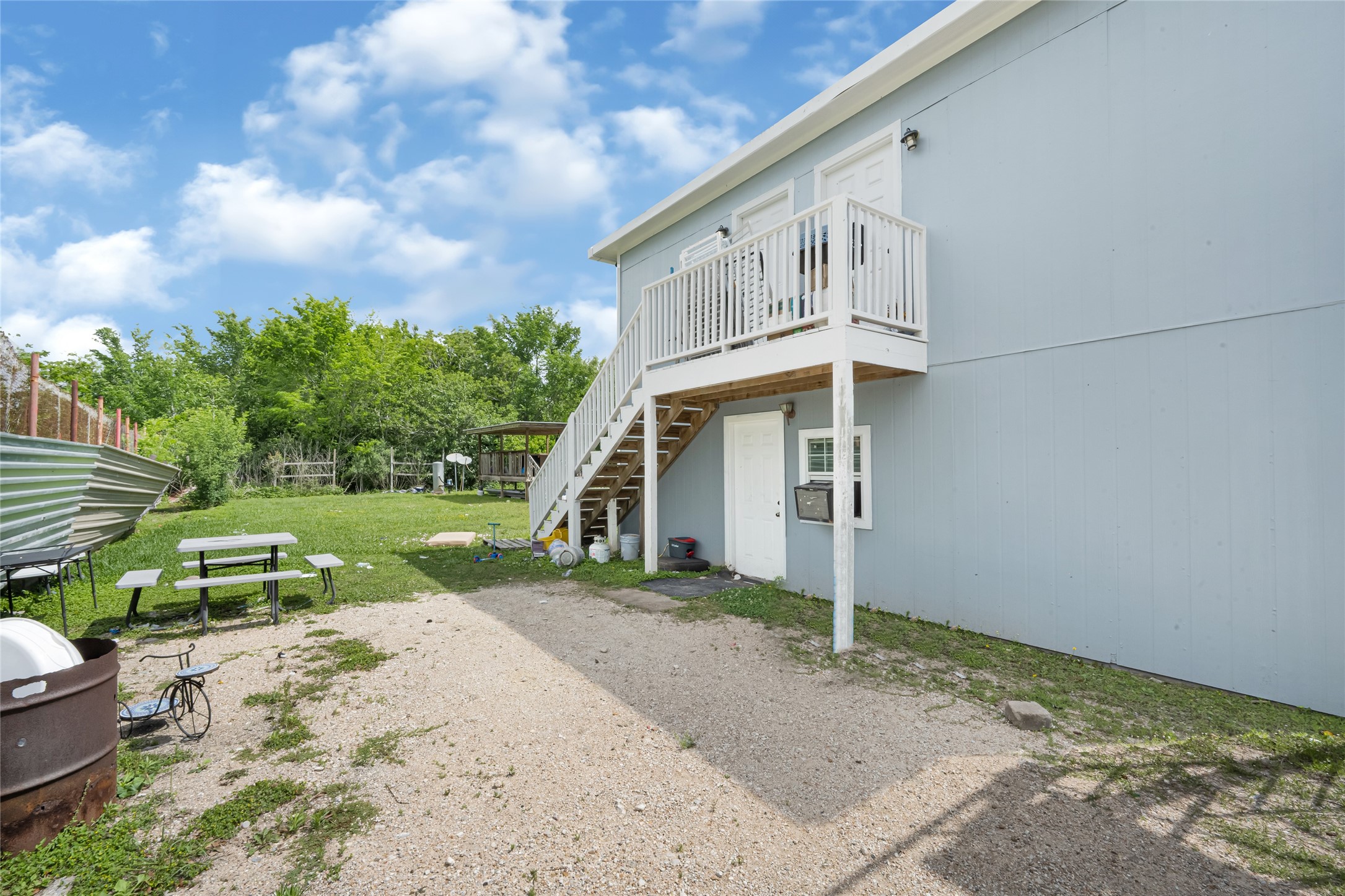 811 Coen Road Rosharon, TX 77583 - Photo 21 of 23 a view of a house with a yard