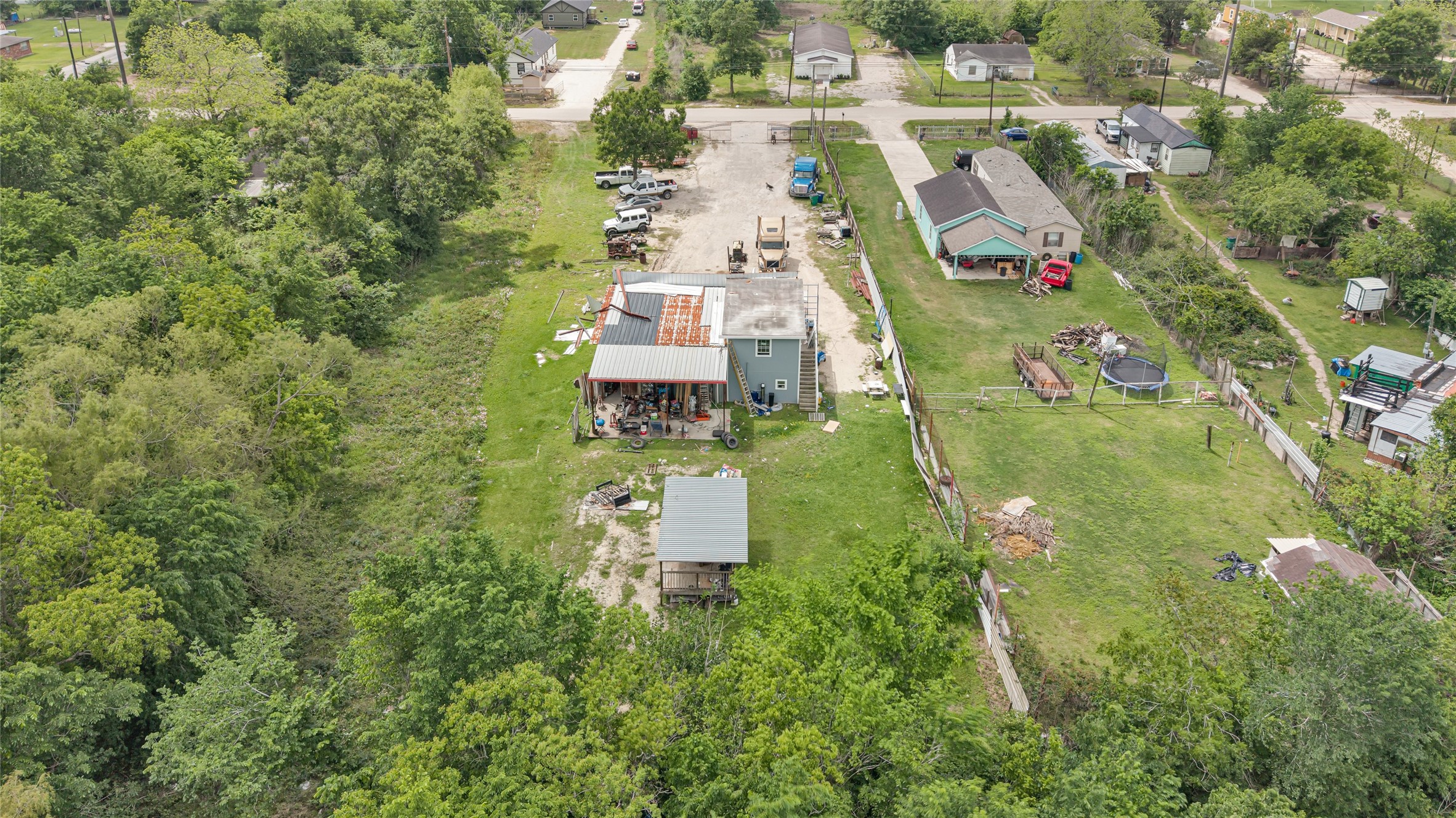 811 Coen Road Rosharon, TX 77583 - Photo 4 of 23 an aerial view of residential houses with outdoor space