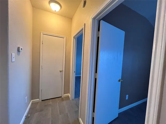 a bathroom with a sink a toilet a mirror and vanity