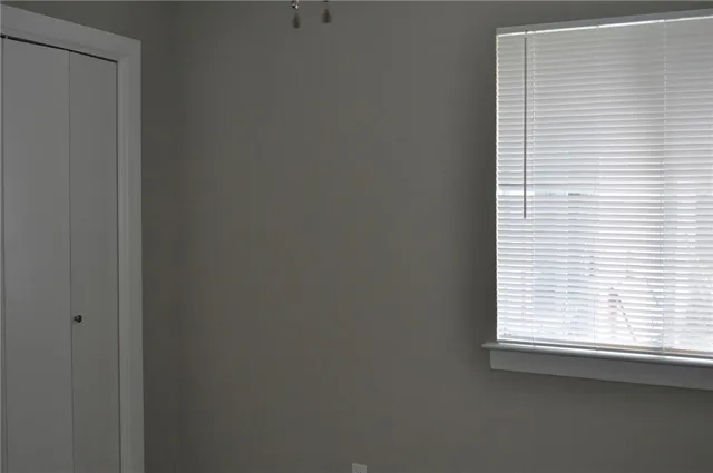 a view of a window in an empty room