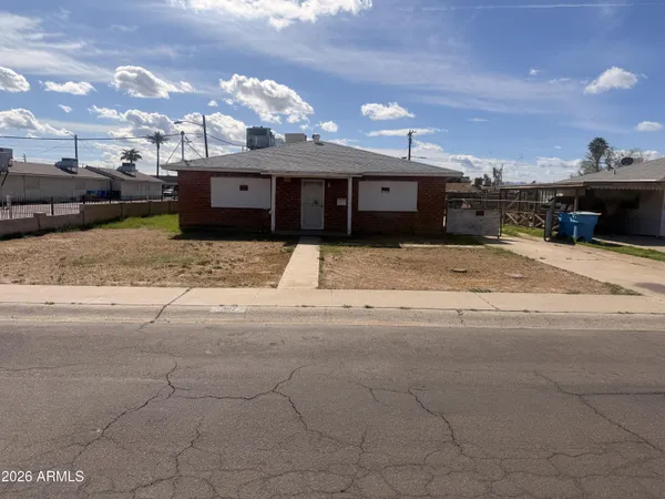 a view of a house with a snow in front of it