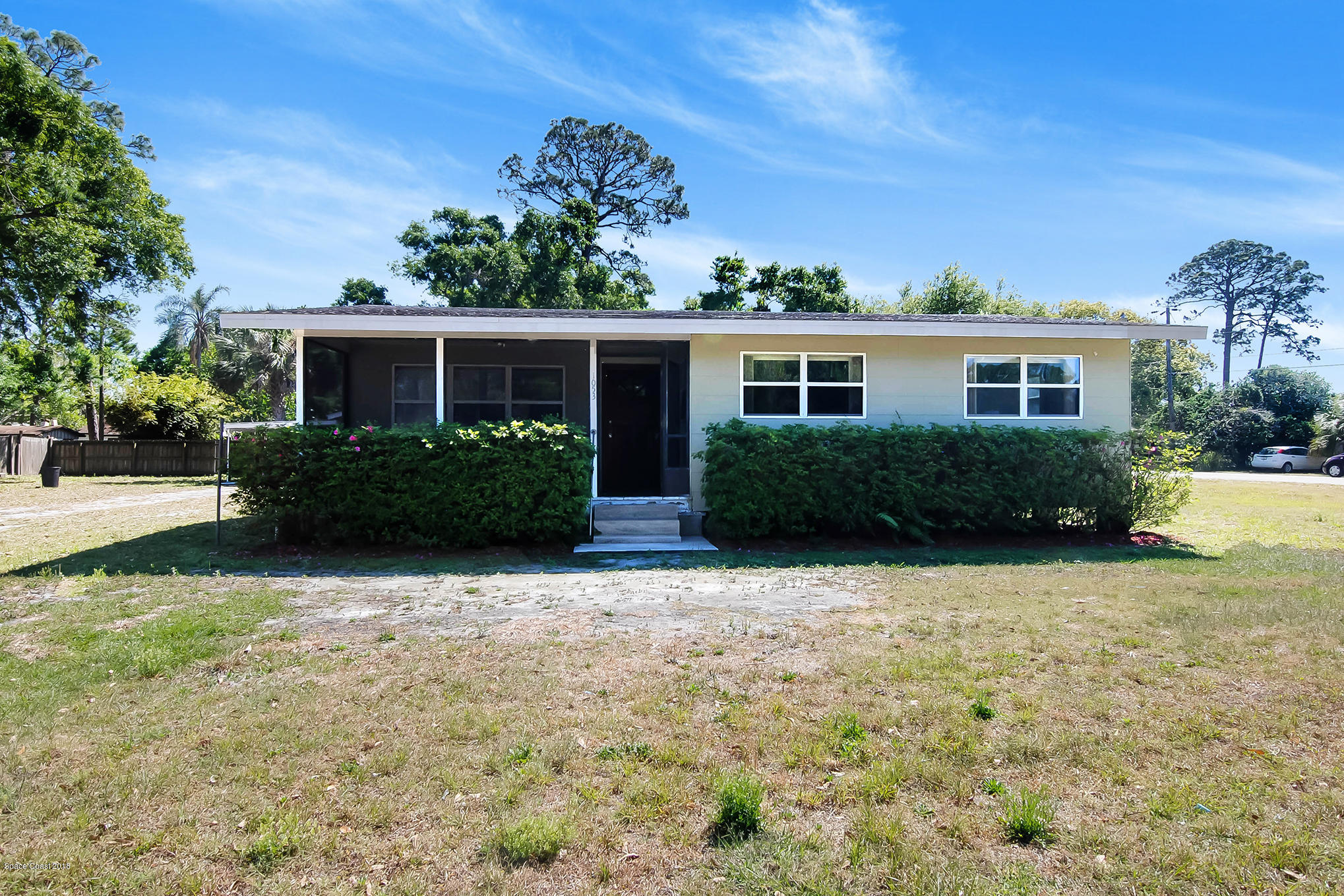 1053 Bernice Road Rockledge, FL 32955 - Photo 2 of 30 front view of a house with a yard