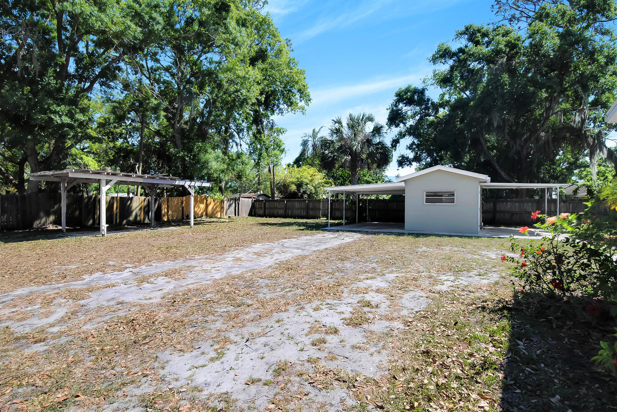 1053 Bernice Road Rockledge, FL 32955 - Photo 12 of 30 a front view of house with a garden