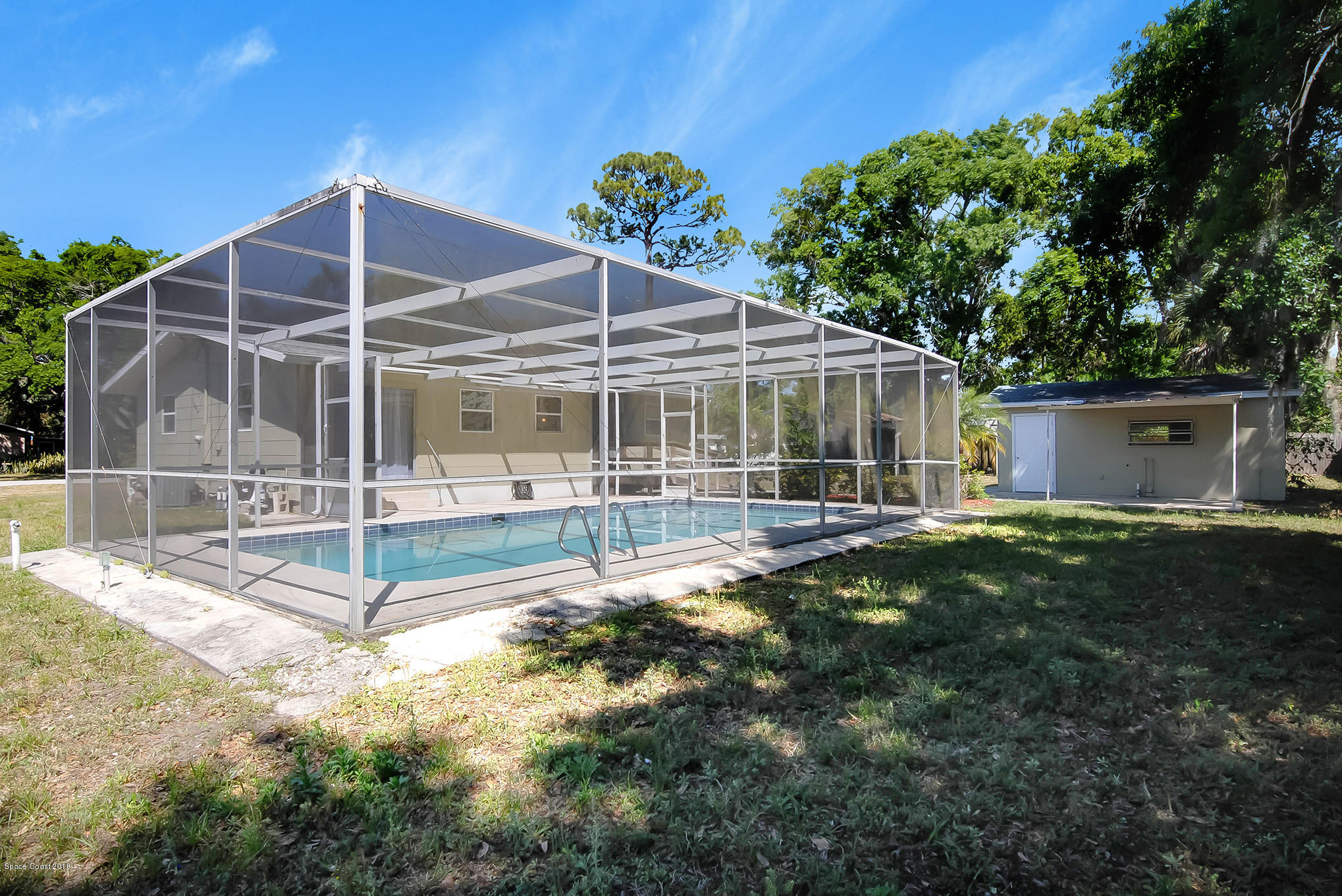 1053 Bernice Road Rockledge, FL 32955 - Photo 9 of 30 a view of a house with backyard and sitting area