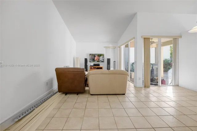 a living room with a couch and a table in it