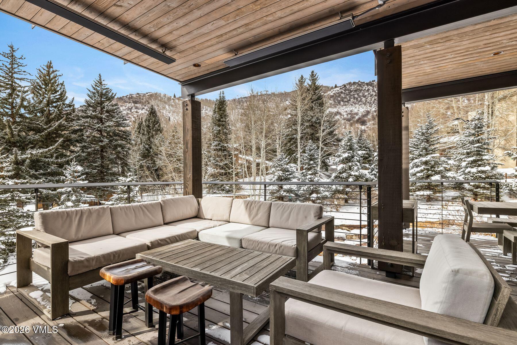 2440 Chamonix Lane Vail, CO 81657 - Photo 13 of 36 a outdoor living space with patio furniture