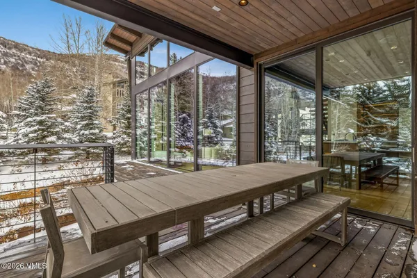 a outdoor sitting area with view of the house