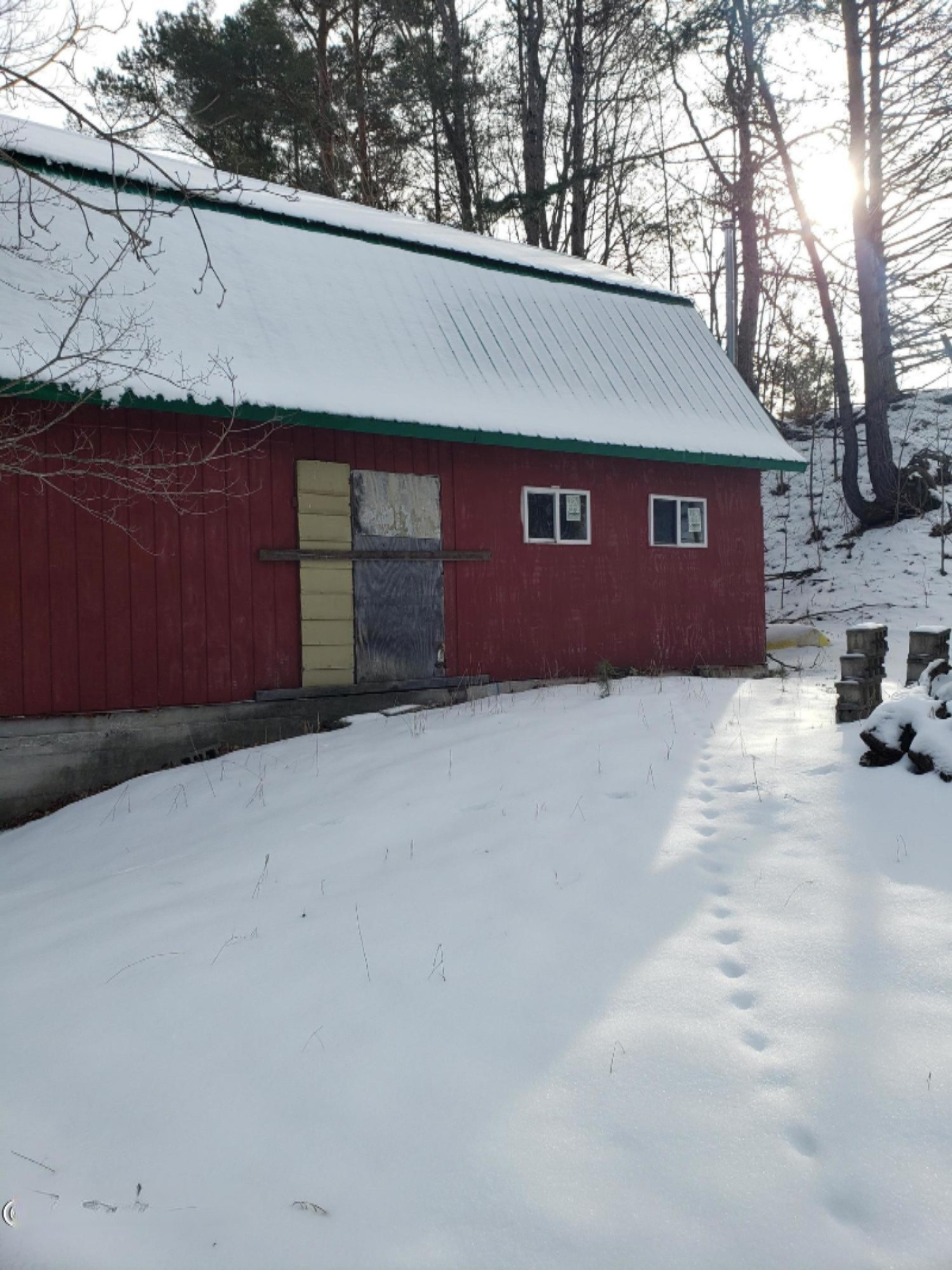 7494 North High Bridge Road Kaleva, MI 49645 - Photo 9 of 23 barn west side