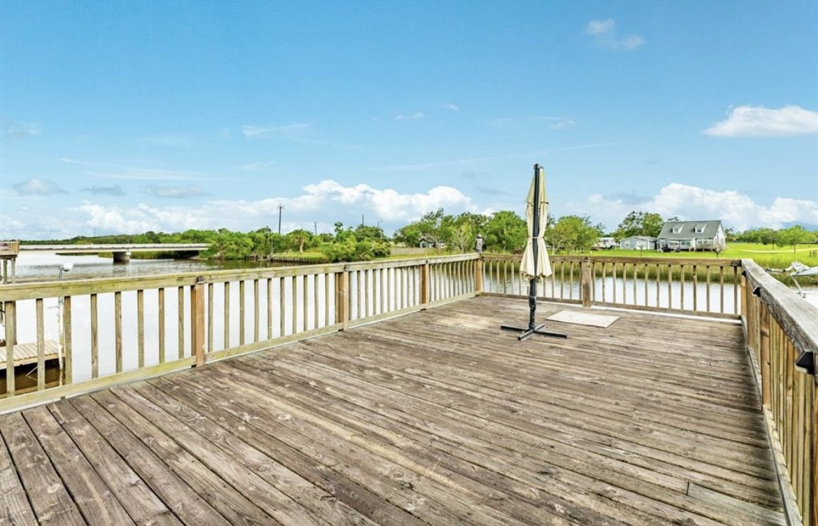 131 Bastrop Bayou Drive Angleton, TX 77515 - Photo 28 of 36 a view of a balcony with wooden floor