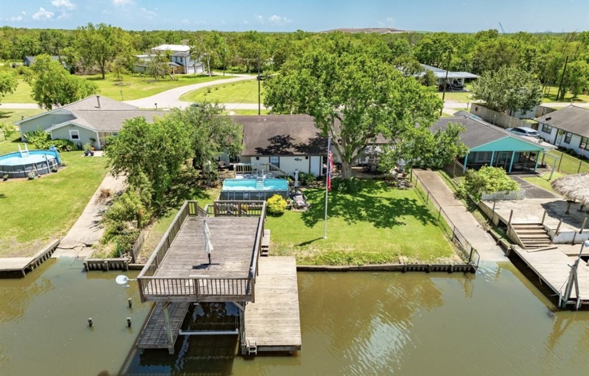 131 Bastrop Bayou Drive Angleton, TX 77515 - Photo 3 of 36 a view of an ocean and city
