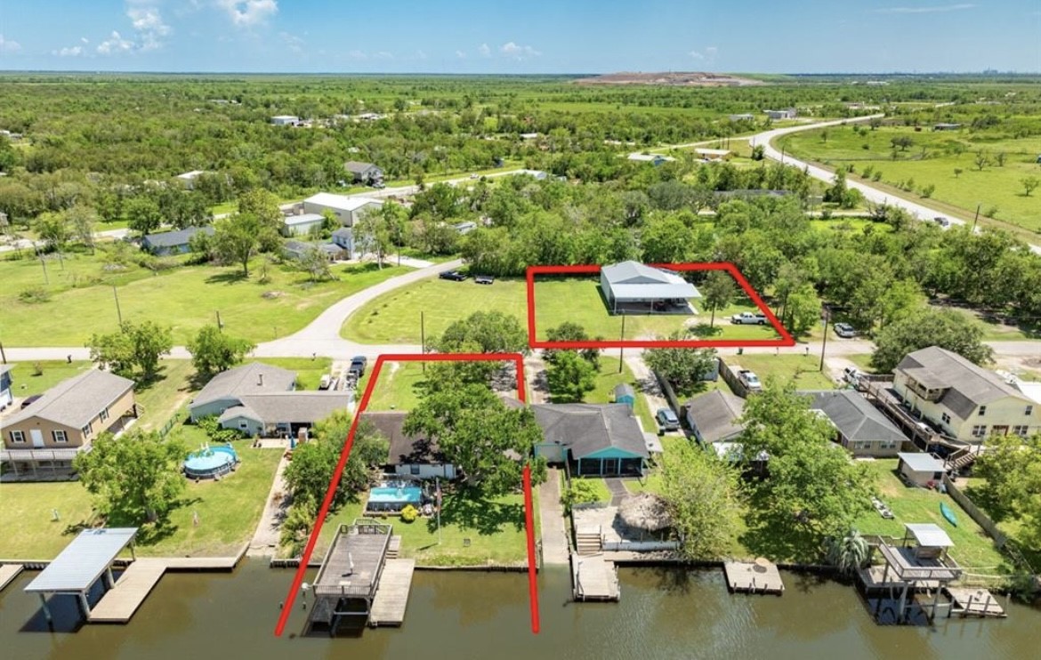 131 Bastrop Bayou Drive Angleton, TX 77515 - Photo 6 of 36 an aerial view of residential houses with outdoor space and swimming pool