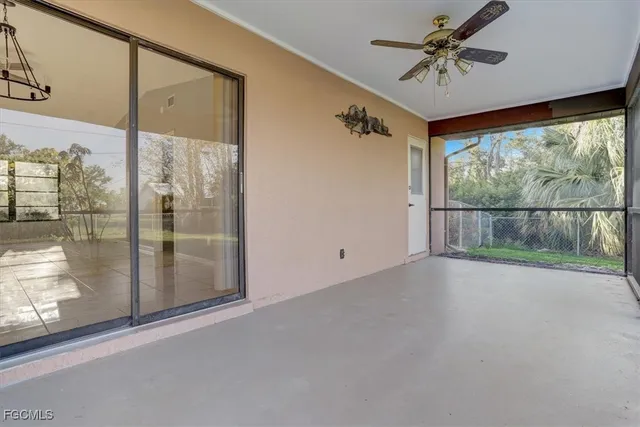 a view of a big room with windows