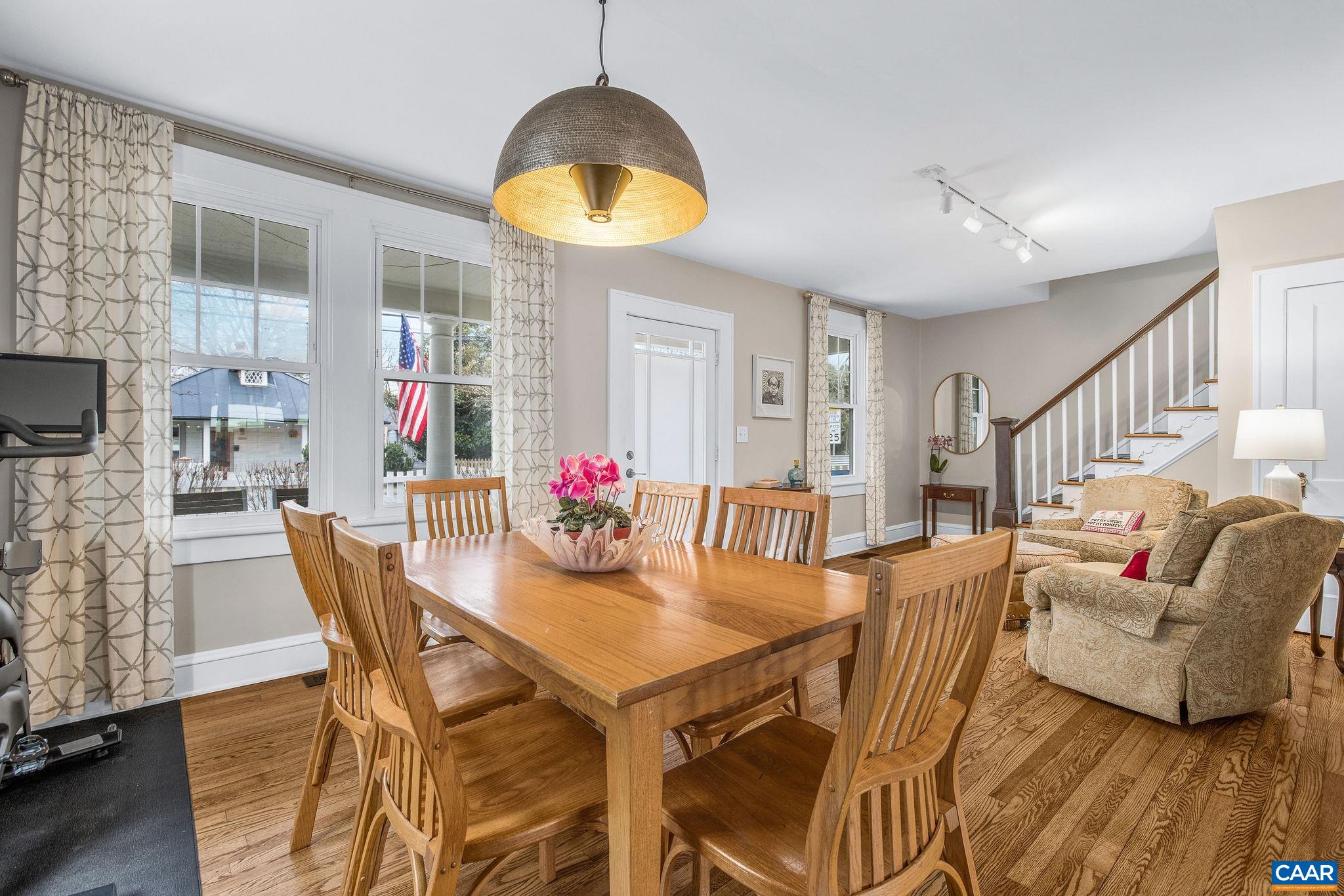 1105 Avon Street Charlottesville, VA 22902 - Photo 13 of 42 a view of a dining room with furniture window and wooden floor