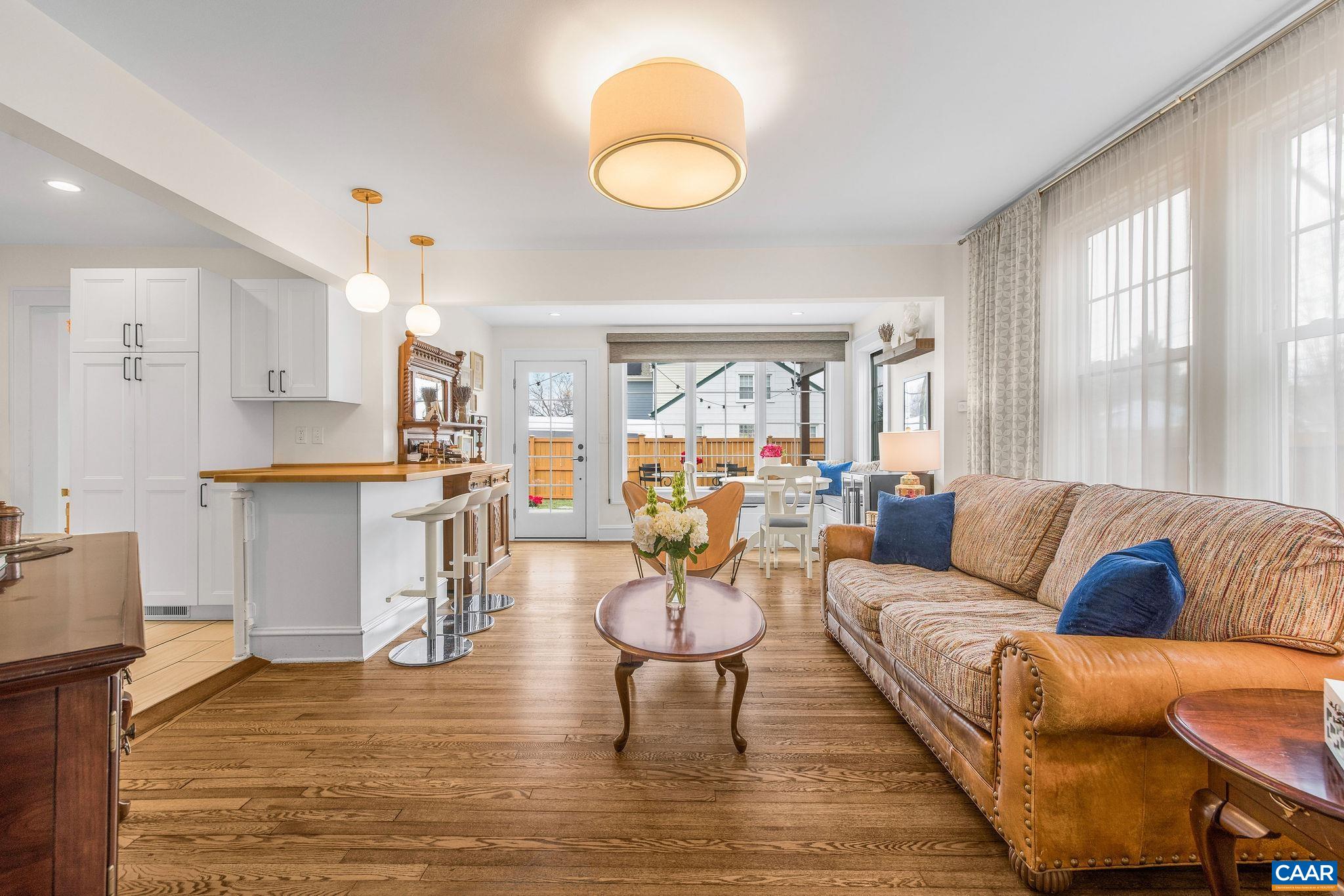 1105 Avon Street Charlottesville, VA 22902 - Photo 15 of 42 a living room with furniture and a large window