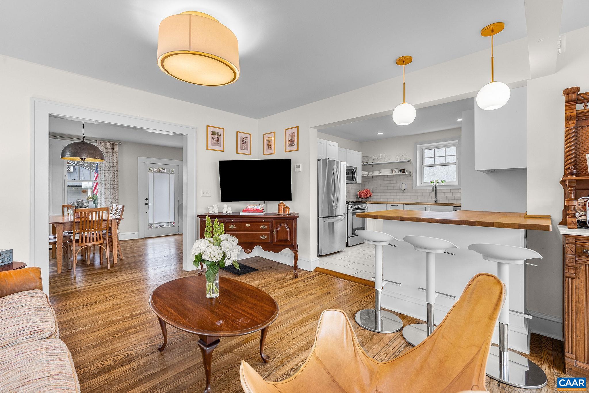 1105 Avon Street Charlottesville, VA 22902 - Photo 17 of 42 a living room with furniture and a flat screen tv