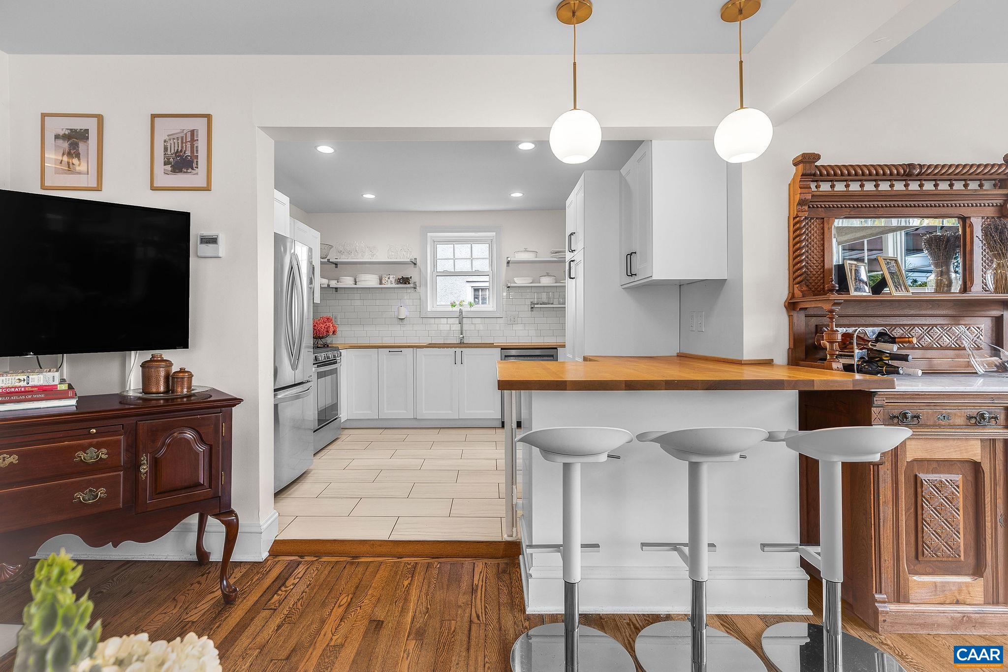 1105 Avon Street Charlottesville, VA 22902 - Photo 20 of 42 a kitchen that has a cabinets counter space and a sink