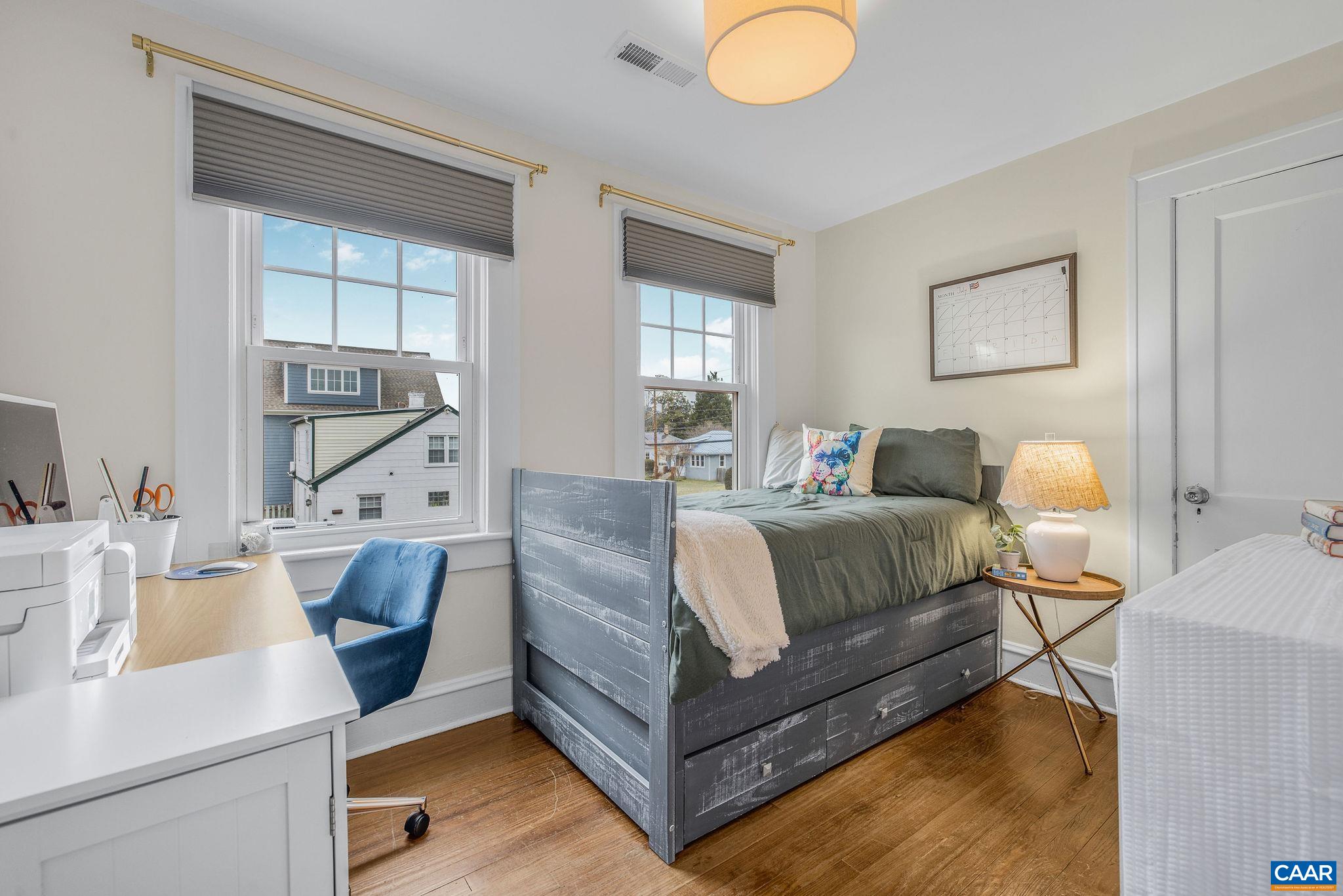 1105 Avon Street Charlottesville, VA 22902 - Photo 38 of 42 a bedroom with a bed and window
