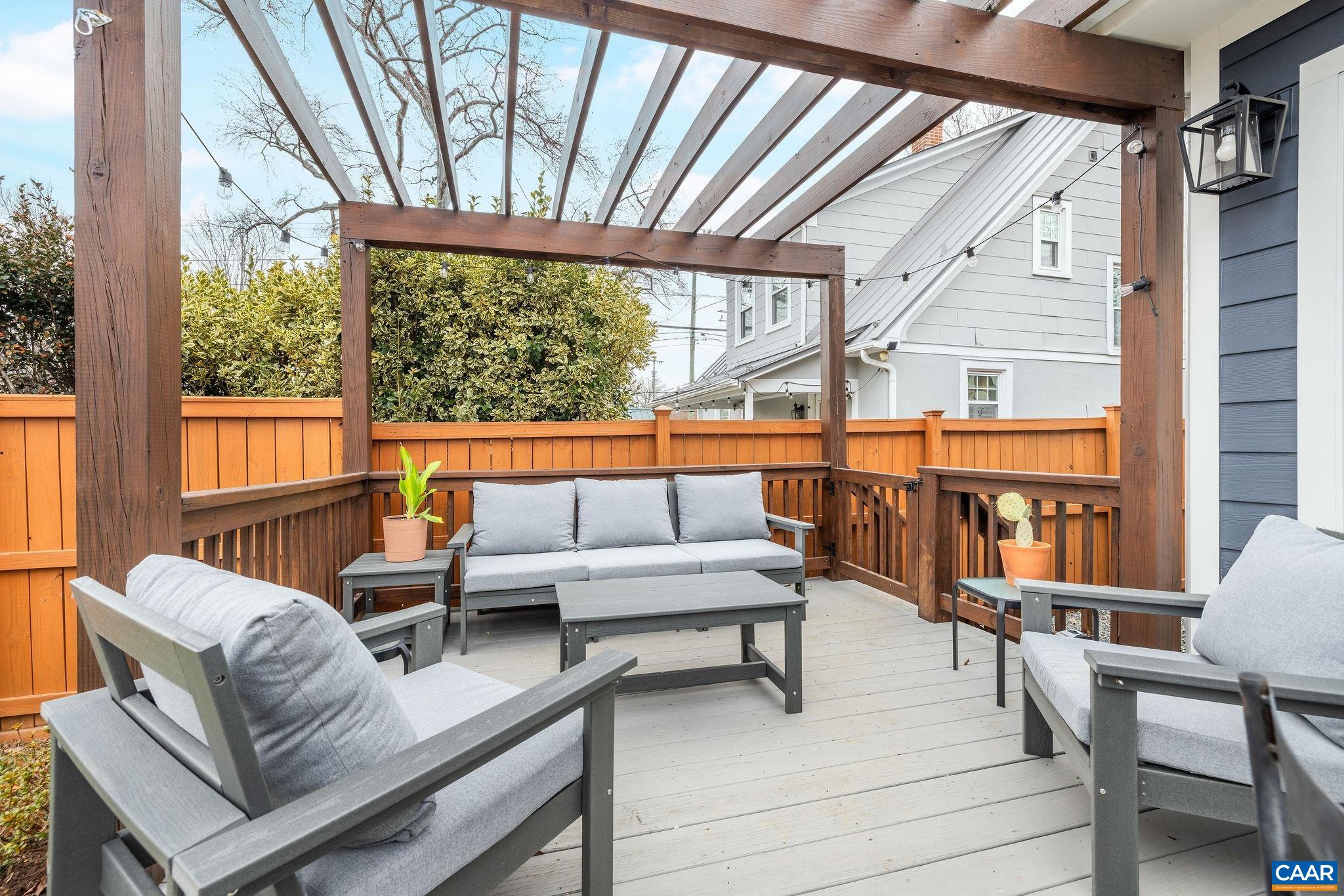 1105 Avon Street Charlottesville, VA 22902 - Photo 7 of 42 a living room with furniture and a large window