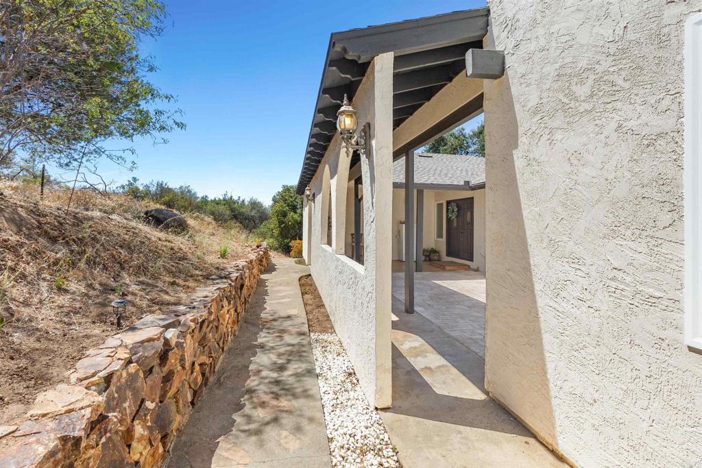 3340 Skytrail Ranch Road Jamul, CA 91935 - Photo 3 of 38 a view of a pathway of a building