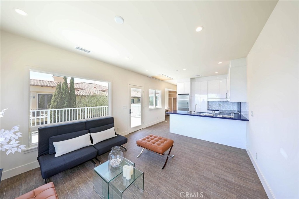 376 Cliff Drive, Unit C Laguna Beach, CA 92651 - Photo 10 of 22 a living room with a couch and a table
