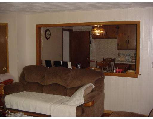 45 Endecott Street Springfield, MA 01118 - Photo 20 of 28 a living room with furniture and dining table