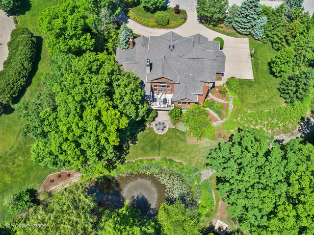 20 Ashton Drive Burr Ridge, IL 60527 - Photo 2 of 59 an aerial view of residential house with an outdoor space and seating