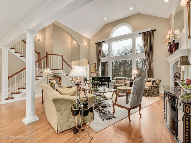 20 Ashton Drive Burr Ridge, IL 60527 - Photo 16 of 59 a living room with furniture large window and wooden floor