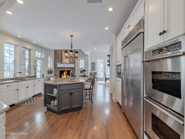 20 Ashton Drive Burr Ridge, IL 60527 - Photo 22 of 59 a kitchen with stainless steel appliances a stove a sink and a refrigerator