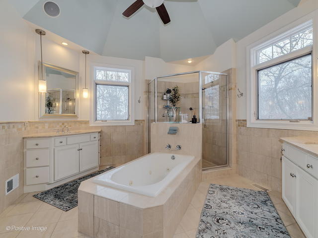 20 Ashton Drive Burr Ridge, IL 60527 - Photo 29 of 59 a spacious bathroom with a tub sink and mirror