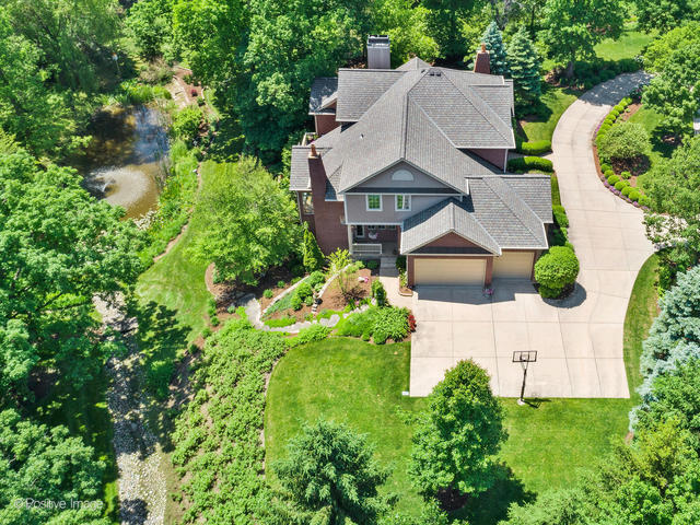 20 Ashton Drive Burr Ridge, IL 60527 - Photo 55 of 59 an aerial view of a house with swimming pool and garden