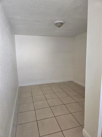 a bathroom with a sink toilet and mirror