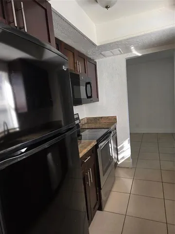 a kitchen with a stove