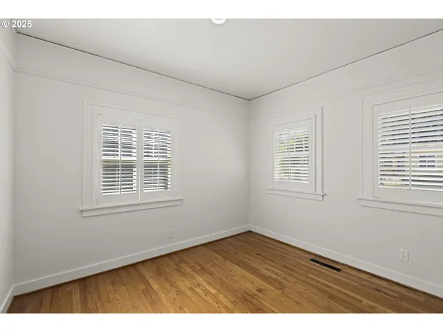 a bathroom with a sink a mirror and a shower