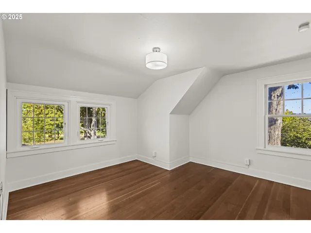 a bathroom with a sink toilet and mirror