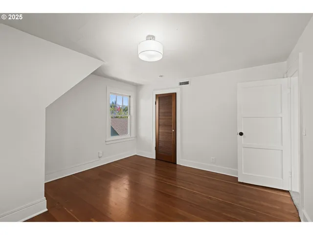 a bathroom with a sink a mirror and shower