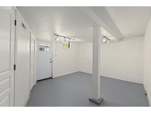 a view of a house with a garden