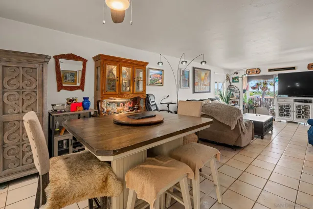 a kitchen with granite countertop a sink and cabinets