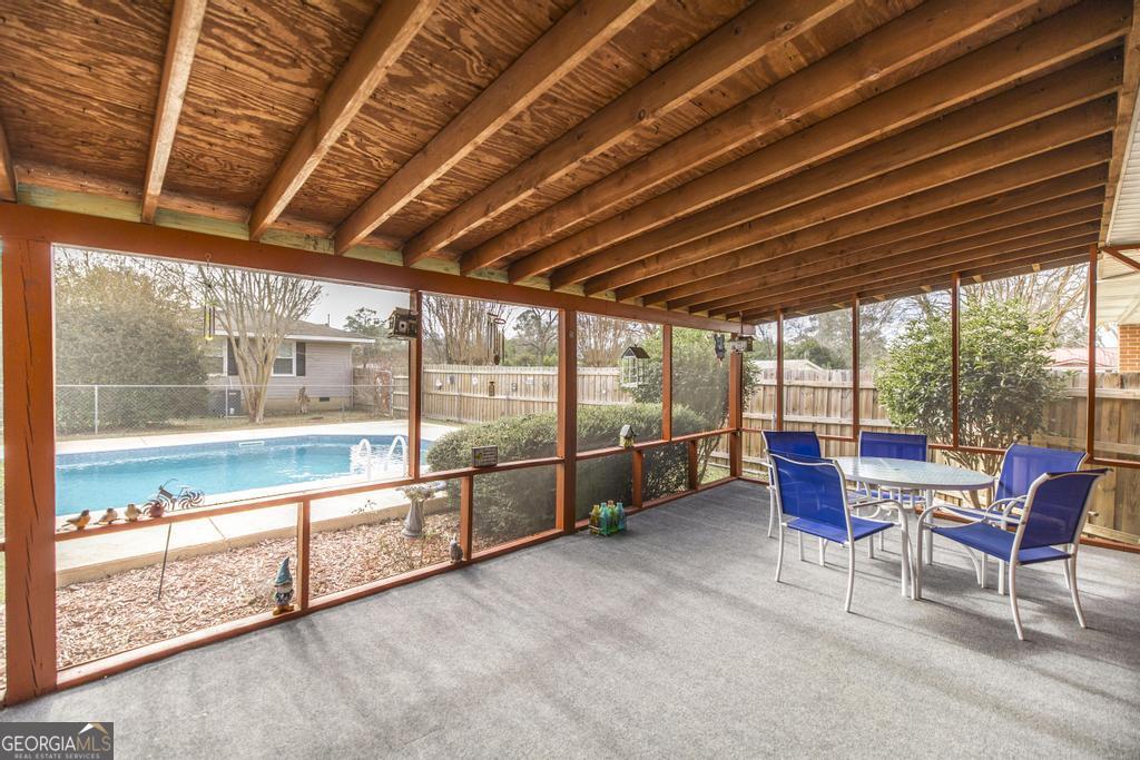 188 Lewis Street Cochran, GA 31014 - Photo 28 of 46 a room with pool table and a large window
