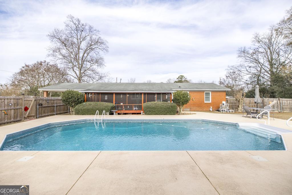188 Lewis Street Cochran, GA 31014 - Photo 31 of 46 a view of a house with garden