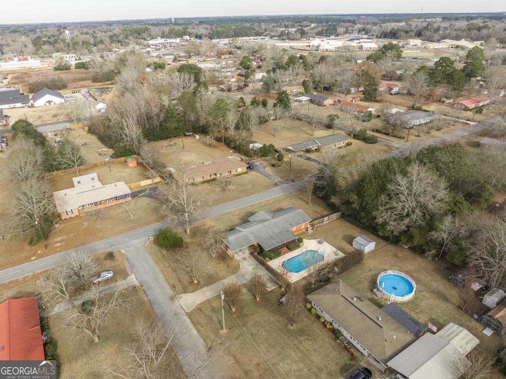 188 Lewis Street Cochran, GA 31014 - Photo 42 of 46 an aerial view of residential houses with outdoor space