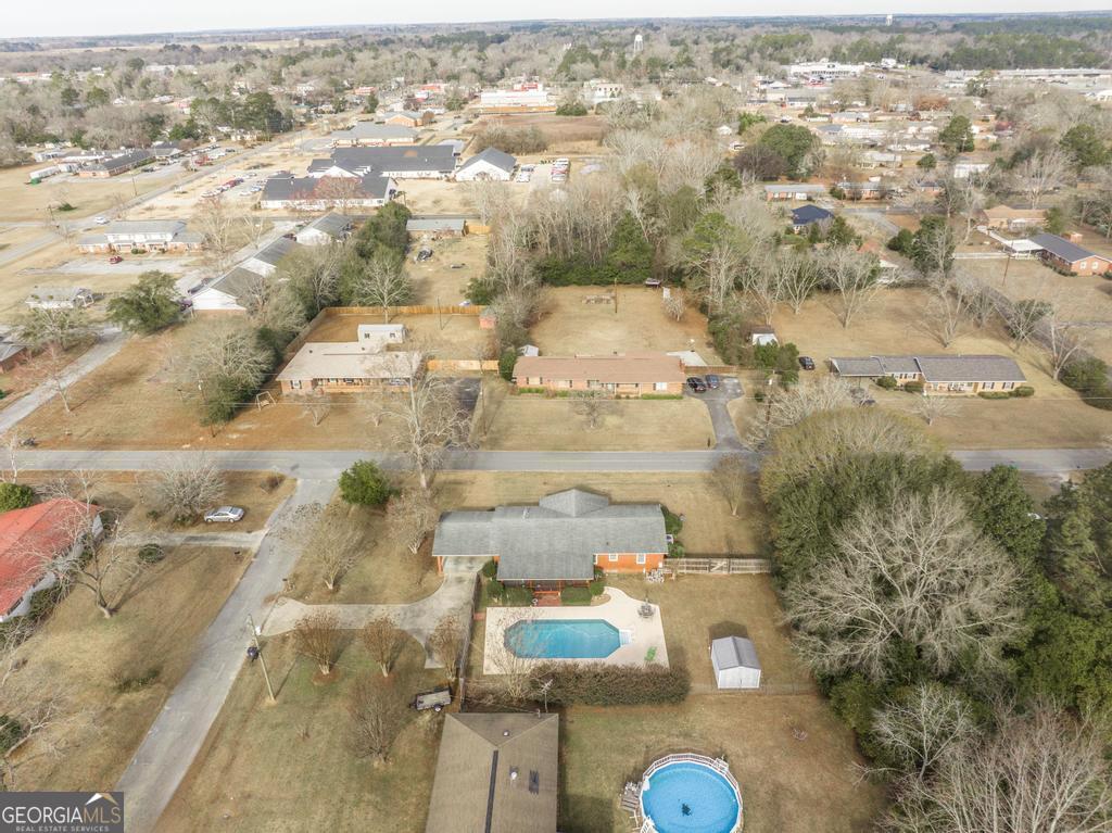 188 Lewis Street Cochran, GA 31014 - Photo 43 of 46 an aerial view of residential houses with outdoor space