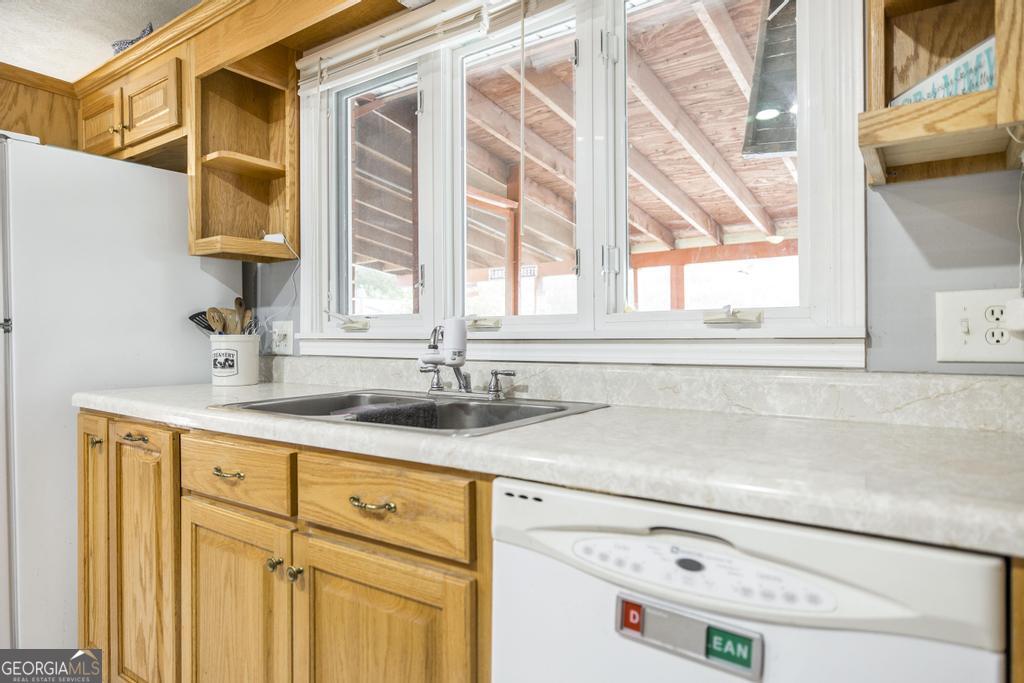 188 Lewis Street Cochran, GA 31014 - Photo 9 of 46 a bathroom with a sink and a window