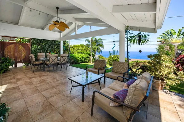 a outdoor space with lots of tables and chairs