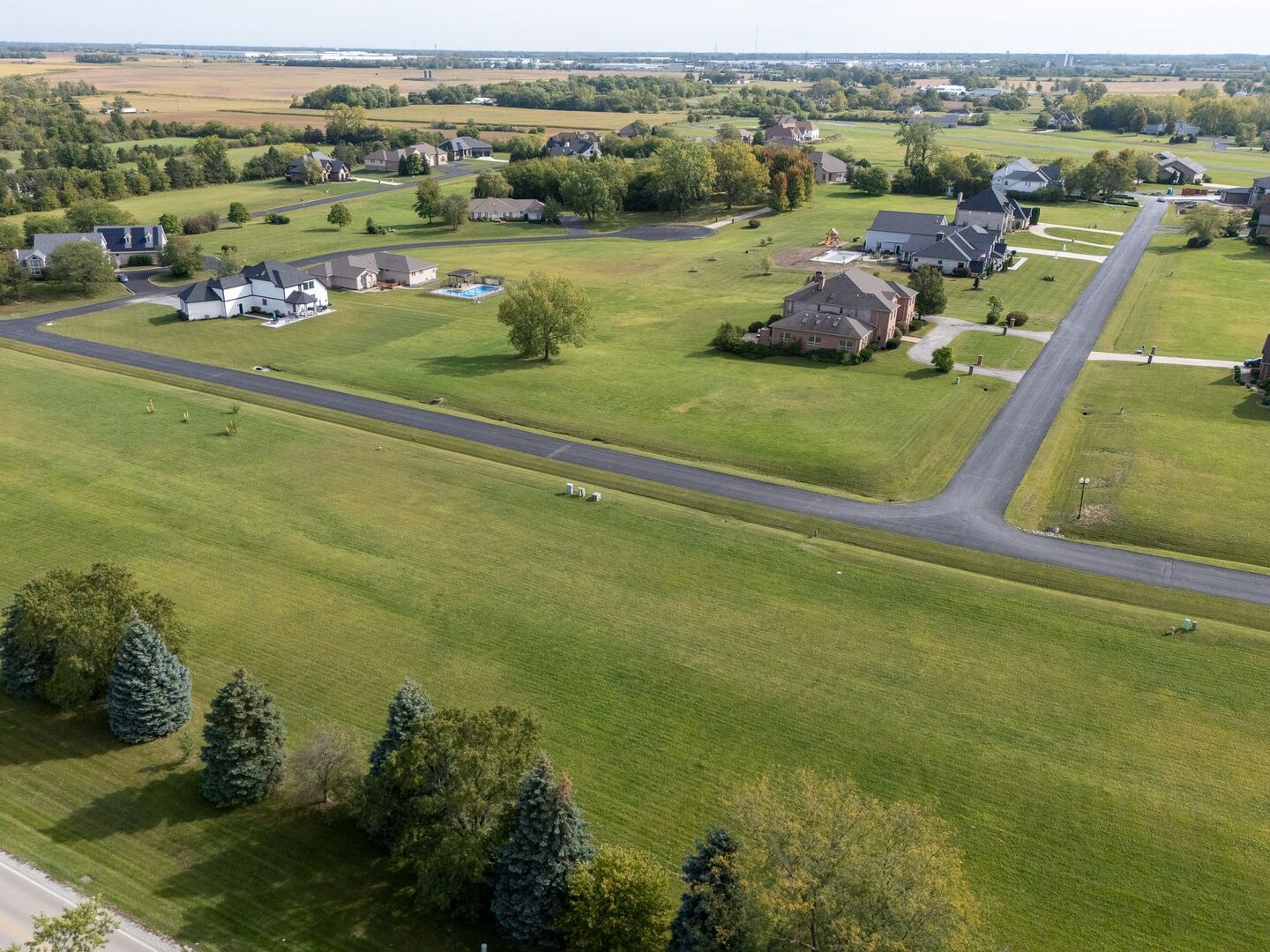 25020 South Chennault Avenue Monee, IL 60449 - Photo 6 of 6 an aerial view of a house with a garden and lake view