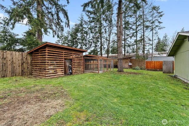 a backyard of a house with lots of green space