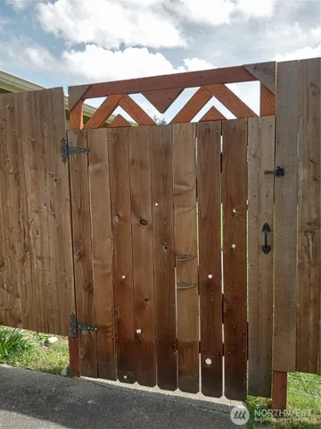 a view of a bathroom with a shower and a sink