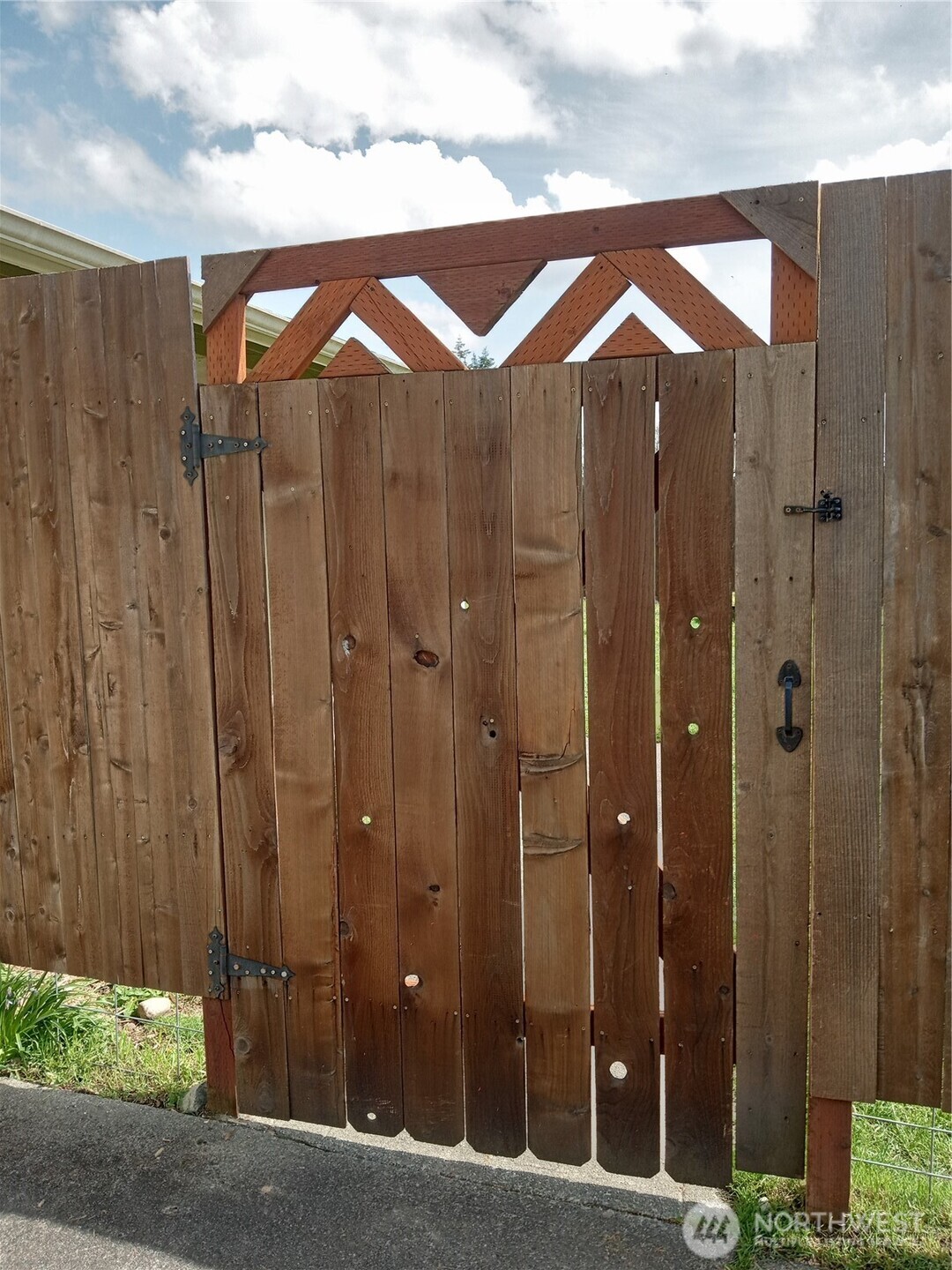 10227-10229 Ainsworth Avenue South Tacoma, WA 98444 - Photo 21 of 23 a view of a bathroom with a shower and a sink