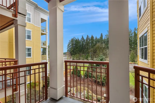 a view of a balcony with many windows